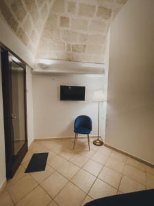 TV a/nebo společenská místnost v ubytování B&B Stellamarina + 26 fotografií