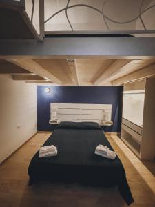 Ένα ή περισσότερα κρεβάτια σε δωμάτιο στο B&B Stellamarina