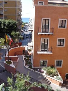 an aerial view of a city street with buildings at Artemis Hotel in Cefalù