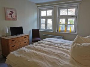 Katil atau katil-katil dalam bilik di Ferienwohnung am Aegidiiplatz