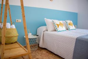Postel nebo postele na pokoji v ubytování H El Palmeral Playa