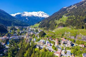 an aerial view of a town in a valley with mountains at Grenzberg - Bad Gastein in Bad Gastein