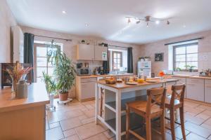 A kitchen or kitchenette at Une parenthèse en Ardenne