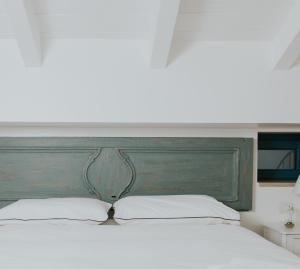 Postel nebo postele na pokoji v ubytování Zia Marietta Guest House