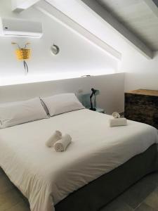 Postel nebo postele na pokoji v ubytování Zia Marietta Guest House