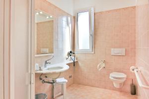 Koupelna v ubytování Hotel La Perla
