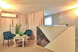 Posezení v ubytování Hotel La Perla