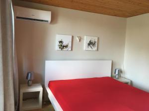 Voodi või voodid majutusasutuse Nefelejcs Apartman toas