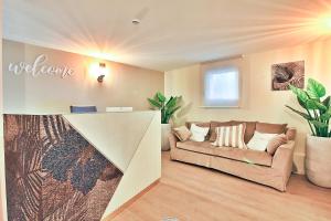 Posezení v ubytování Hotel La Perla