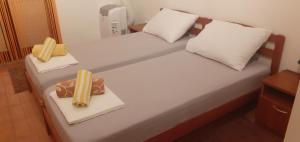 Posteľ alebo postele v izbe v ubytovaní Apartman GRL