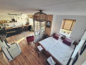 Kuchyň nebo kuchyňský kout v ubytování B&B Duinbrink
