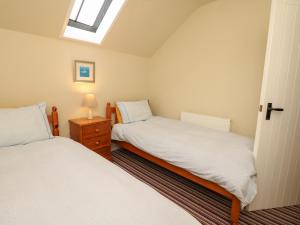 Postel nebo postele na pokoji v ubytování The Linney