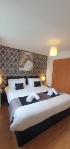 Cama o camas de una habitación en Jacobs Apartment Edinburgh