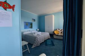 Postel nebo postele na pokoji v ubytování Residence Villa Ambra