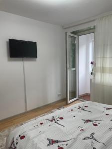 Postel nebo postele na pokoji v ubytování Apartament Denisa