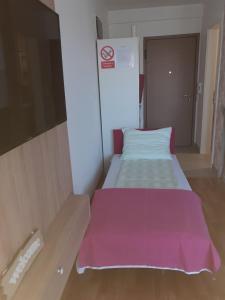 Postel nebo postele na pokoji v ubytování Apartman Krasula Doboj