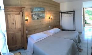 Postel nebo postele na pokoji v ubytování Abel Hôtel