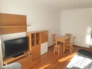 TV a/nebo společenská místnost v ubytování Alquiler Vacacional Noia