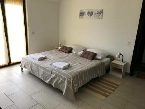 Fotografie z fotogalerie ubytování Apartment in Lopar with sea view, balcony, air conditioning, Wi-Fi (4607-5) v destinaci Lopar