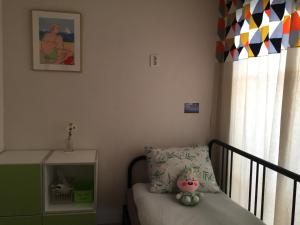 Postel nebo postele na pokoji v ubytování Inside Busan Hostel
