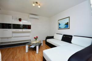 Ένα ή περισσότερα κρεβάτια σε δωμάτιο στο Apartment with sea view 3558-3