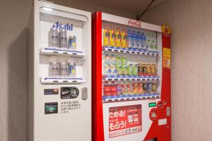 two vending machines with soda and sodas at Hotel Tenjin Place in Fukuoka