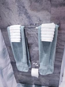 two towels on a towel rack in a bathroom at M/H House in Carolina