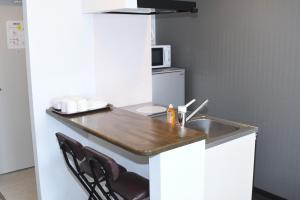 Кухня или мини-кухня в Hotel Urbansea 2 Matsuo
