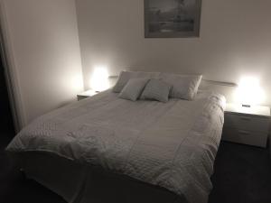 Tempat tidur dalam kamar di Golden Retreat