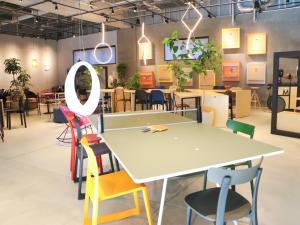 a room with a table and chairs at Hotel The M's Kyoto in Kyoto