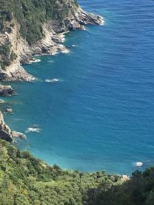a view of the ocean from a mountain at Infinity view in Vernazza