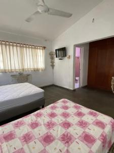 Giường trong phòng chung tại Casa del trébol