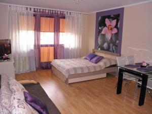 Cama o camas de una habitación en Apartamenty nad Morzem