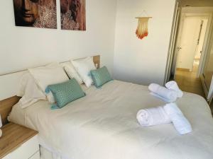 Posteľ alebo postele v izbe v ubytovaní Apartamento playa y club náutico a 150m