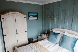 Postel nebo postele na pokoji v ubytování Kilmore Guesthouse