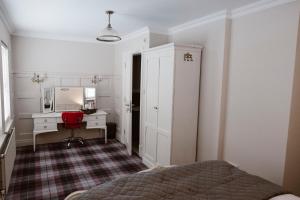 Postel nebo postele na pokoji v ubytování Kilmore Guesthouse