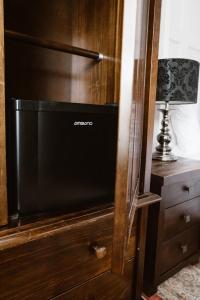 TV a/nebo společenská místnost v ubytování Kilmore Guesthouse