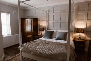 Postel nebo postele na pokoji v ubytování Kilmore Guesthouse