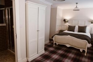 Postel nebo postele na pokoji v ubytování Kilmore Guesthouse