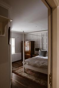 Postel nebo postele na pokoji v ubytování Kilmore Guesthouse
