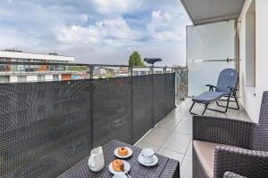 Balkon lub taras w obiekcie Apartamenty Osiedle Bursztynowe III by Noclegi Renters