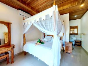 Ein Bett oder Betten in einem Zimmer der Unterkunft Sama Sama Amed