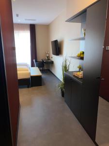 Postel nebo postele na pokoji v ubytování Primetime Hotel