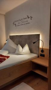 Posteľ alebo postele v izbe v ubytovaní Appartements Haus Olympia