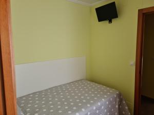 Μια τηλεόραση ή/και κέντρο ψυχαγωγίας στο Apartamento CARACOLEIRO CAION