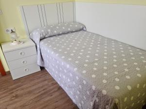 Ένα ή περισσότερα κρεβάτια σε δωμάτιο στο Apartamento CARACOLEIRO CAION