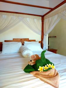 Ein Bett oder Betten in einem Zimmer der Unterkunft Sama Sama Amed