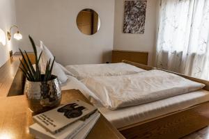 Postel nebo postele na pokoji v ubytování Residence Greymold