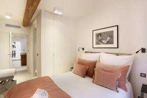 Un pat sau paturi într-o cameră la Maison Skyloft