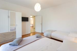Posteľ alebo postele v izbe v ubytovaní Apartment Gazo